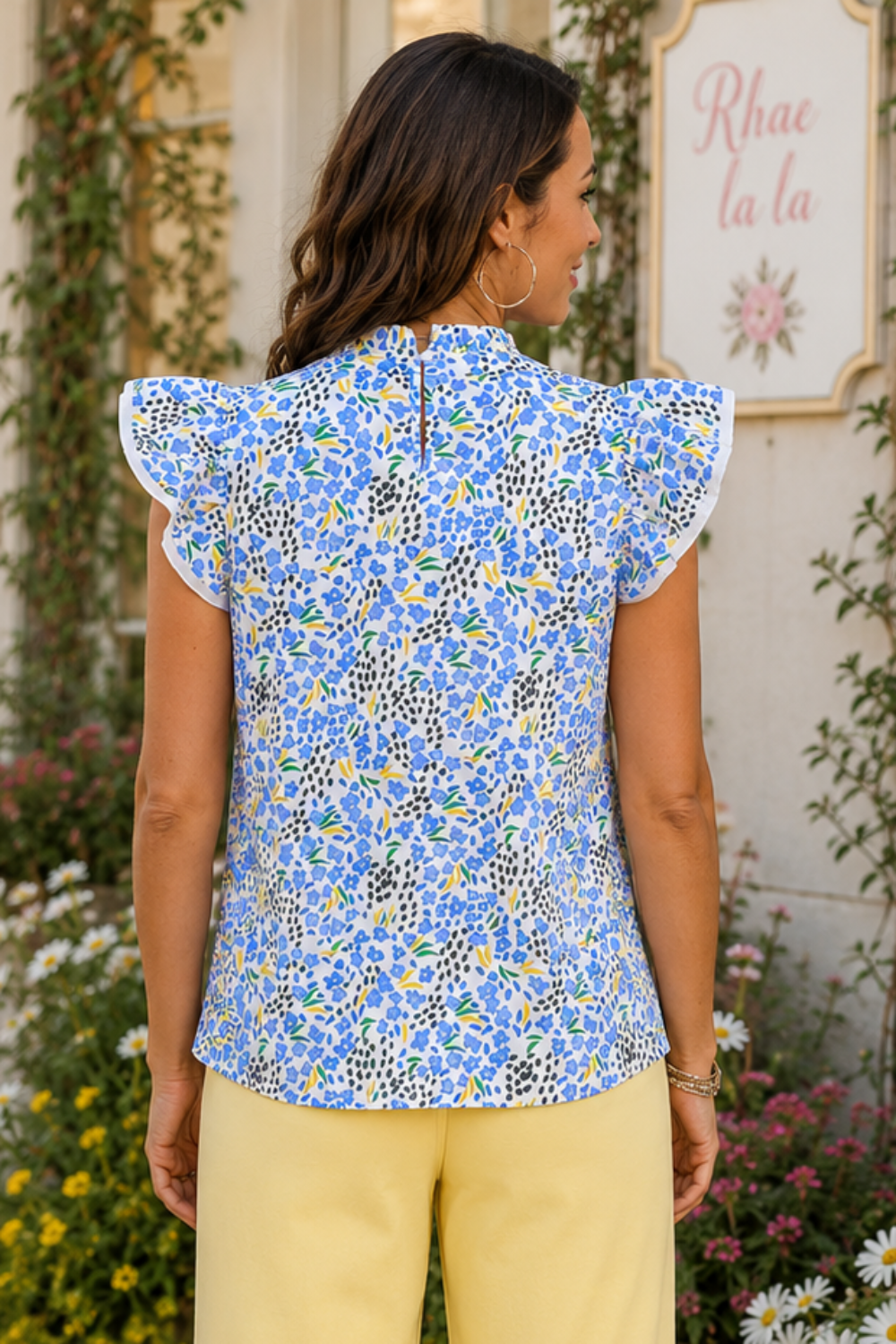 * High neck
* Flutter sleeves
* Abstract print
* Frill
* Keyhole closure
* No stretch