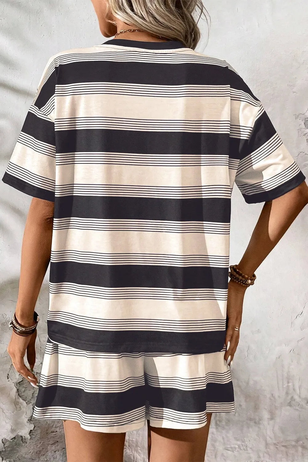 Two-piece short set, round neck, drop shoulder, half sleeves, striped pattern, elastic waist, no drawstring, pocketed, high waist, wide leg, slightly stretchy back view