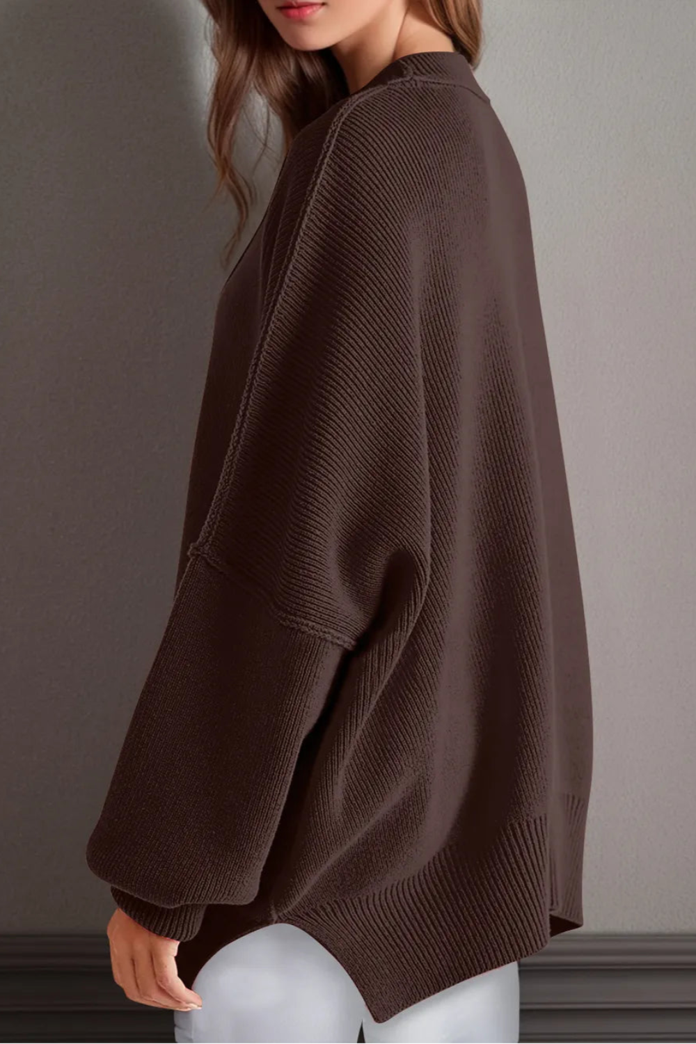 Sweater, oversized, drop shoulder, round neck, exposed seam, long, side slit, ribbed, stretchy side view
