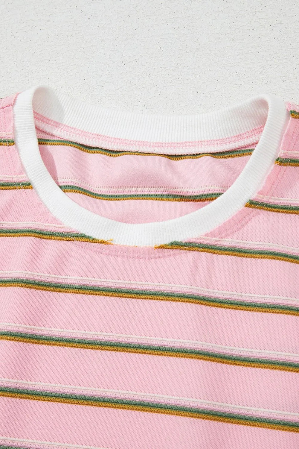 two-piece short set, cap sleeve, round neck, elastic waist, drawstring, front seam detail, wide short striped print, slightly stretchy close up view