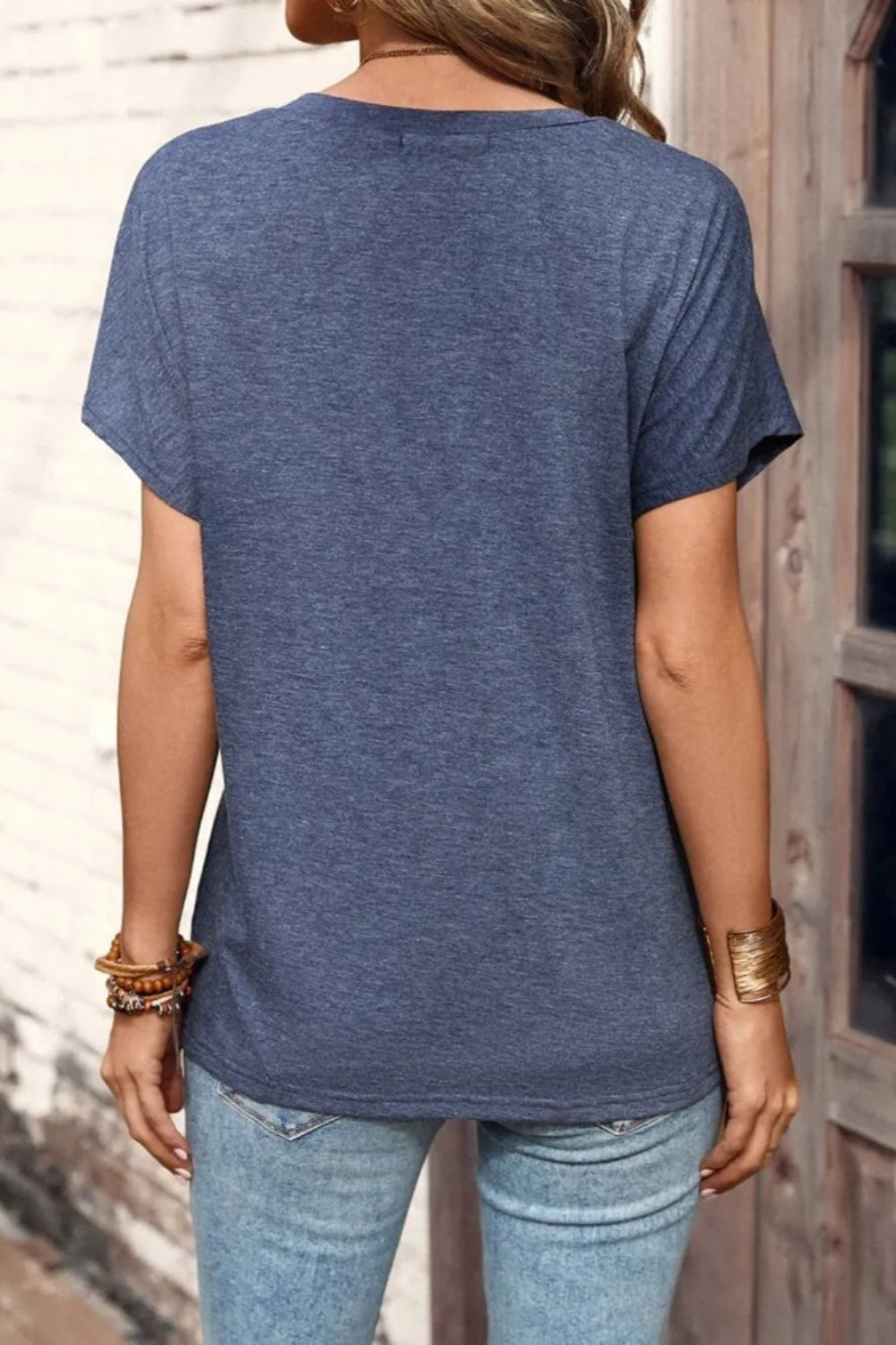 Blouse, short sleeve, pullover, round neck, half buttoned, opaque, no stretch, back view