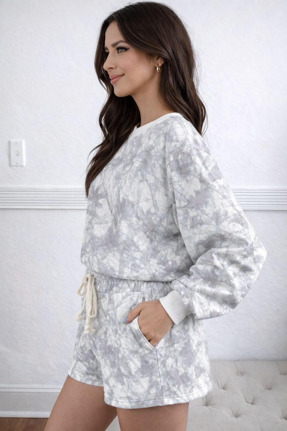 Two-piece lounge set, pullover, round neck, drop shoulder, long sleeve, ribbed, oversized, drawstring shorts, elastic waist, pocketed, no stretch, side view
