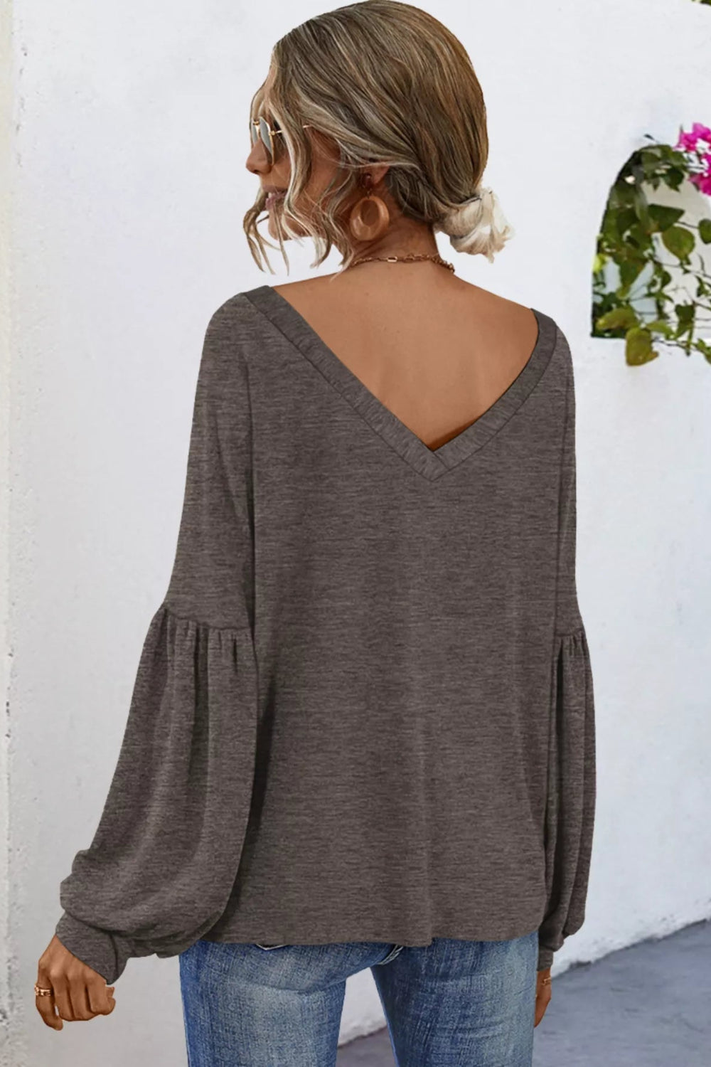Blouse, Oversized, V-neck, Long sleeve, Drop shoulder, puff sleeve, front pocket, cuffed, v-back, sits below the waist, stretchy, back view