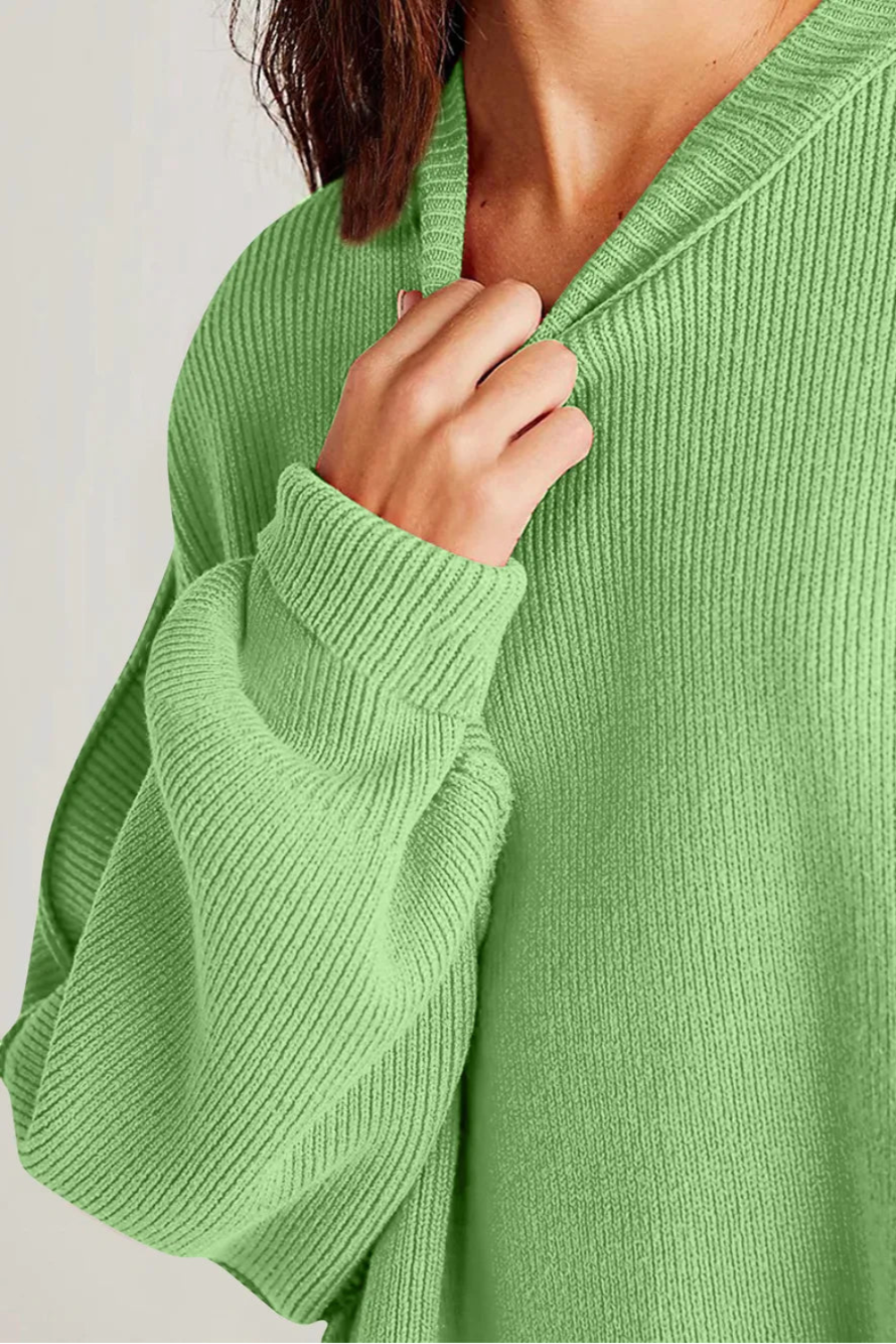 Sweater, oversized, drop shoulder, round neck, exposed seam, long, side slit, ribbed, stretchy front view
