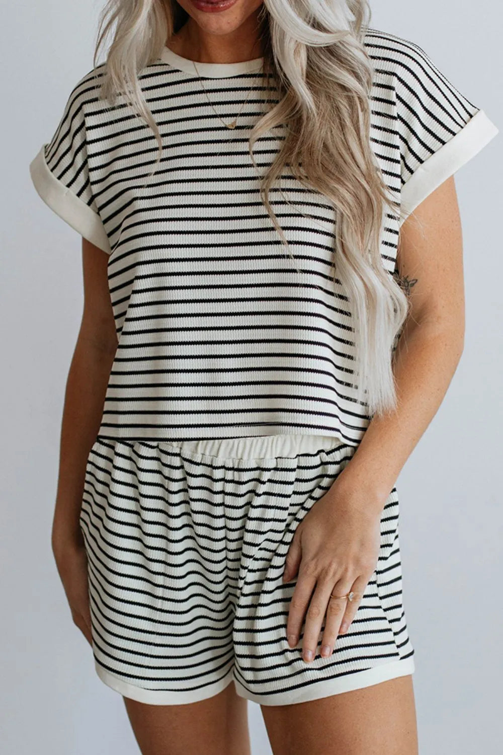 Two-piece short set, short sleeve, cuffed sleeve, cropped, striped pattern, contrast trim, elastic waist, pocketed, no drawstring, slightly stretchy front view