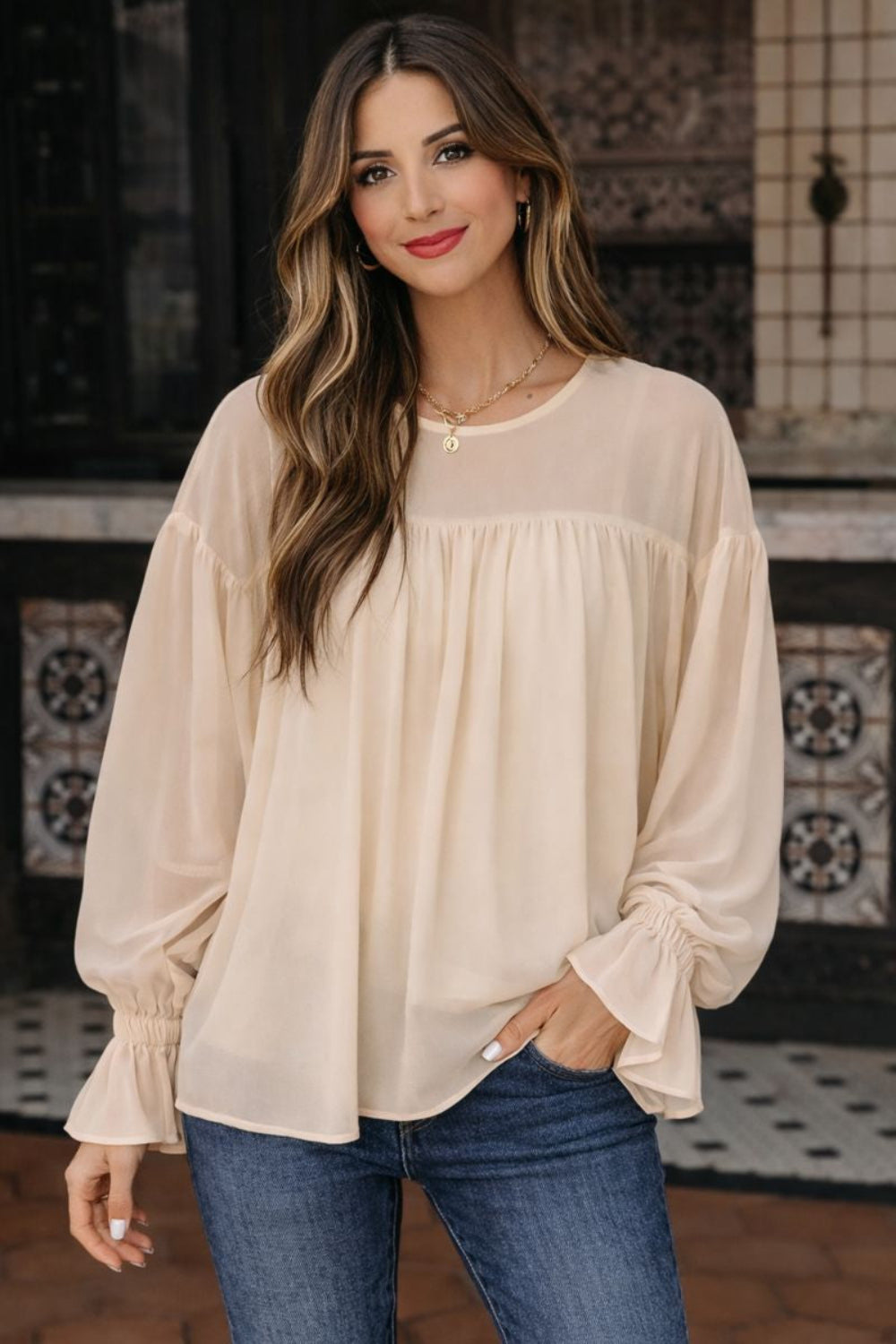 blouse, round neck, drop shoulder, long sleeve, ruffled, sheer arms and shoulders, lined, keyhole closure, oversized, no stretch, front view