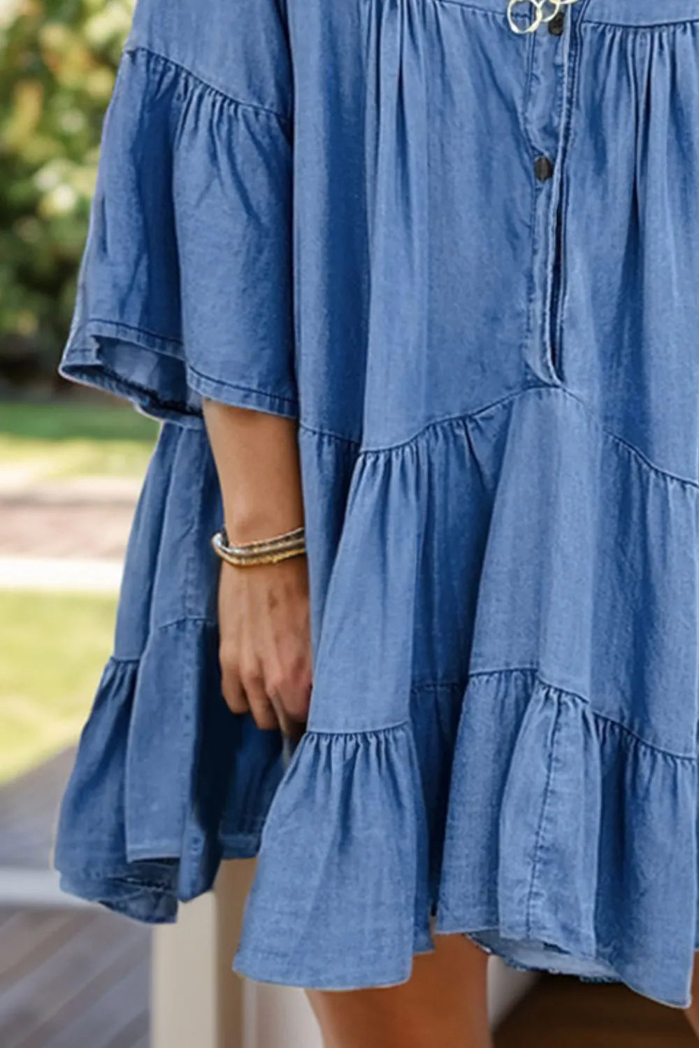 mini dress, notched, flare sleeve, tiered, ruffled, no stretch, denim, medium wash close up view