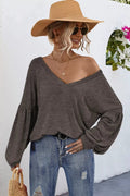 Blouse, Oversized, V-neck, Long sleeve, Drop shoulder, puff sleeve, front pocket, cuffed, v-back, sits below the waist, stretchy, front view