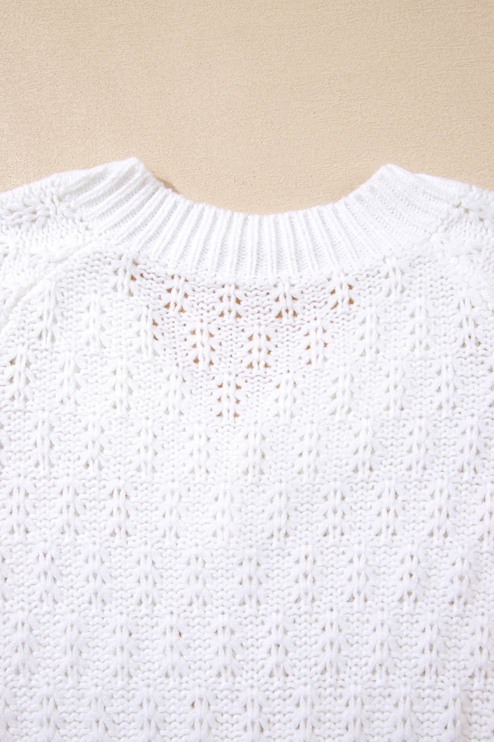 Sweater, pullover, long sleeve, ribbed edges, textured knit, v-neck, eyelet, loose fit, close up view
