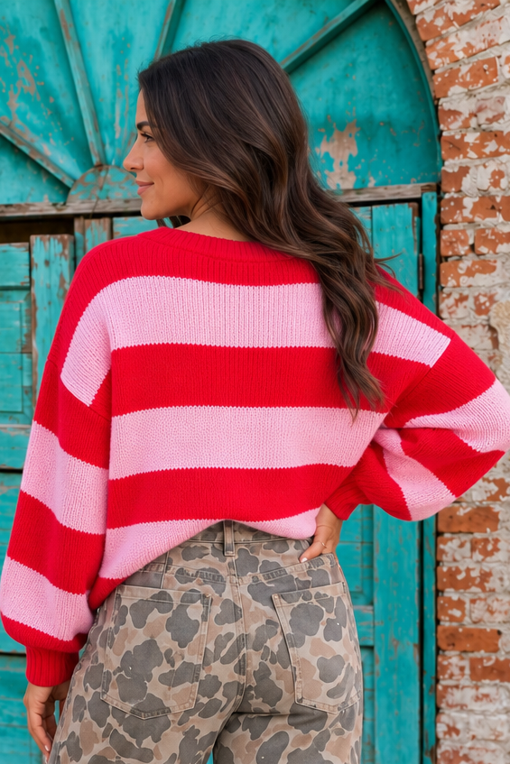 Cherry Crush Sweater in red and pink horizontal stripes, back view showing oversized fit, crew neckline and balloon sleeves.