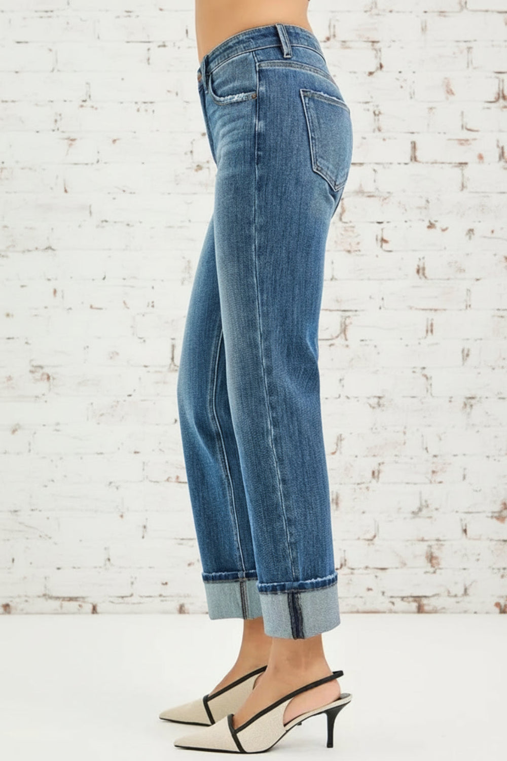 Risen Jeans, full-size, mid-rise, 4-way stretch, cuffed hem, straight leg, dark wash, belt loops, button/zipper closure, pocketed, raw hem, slightly stretchy, side view