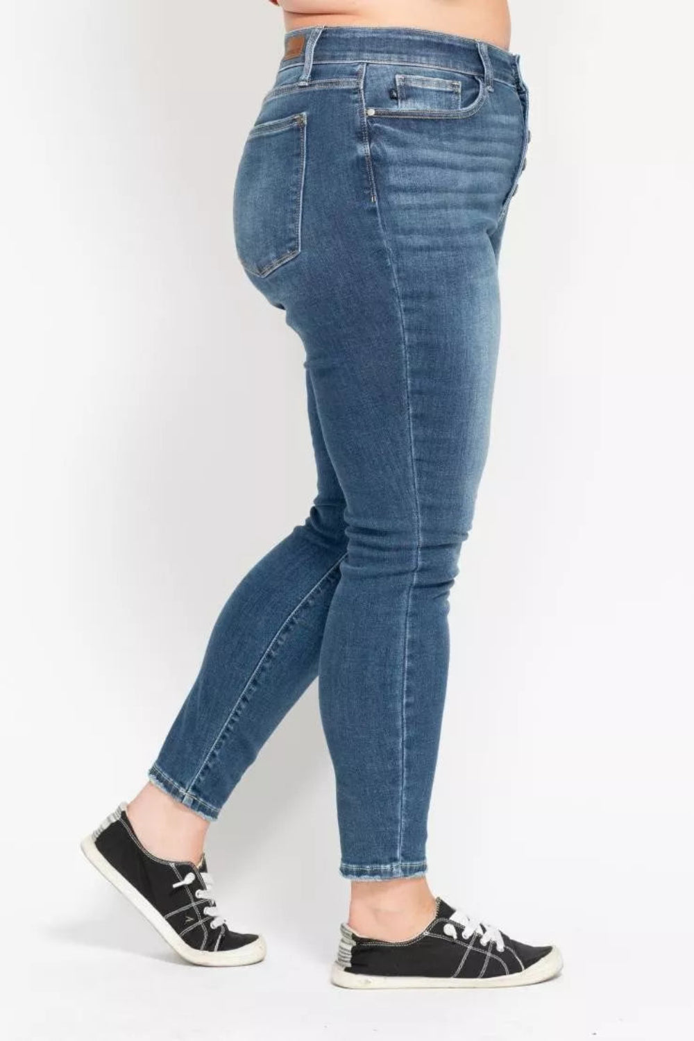 Judy Blue Jeans, full-size, high-rise, button fly, pocketed, belt loops, skinny leg, medium wash, slightly stretchy, side view