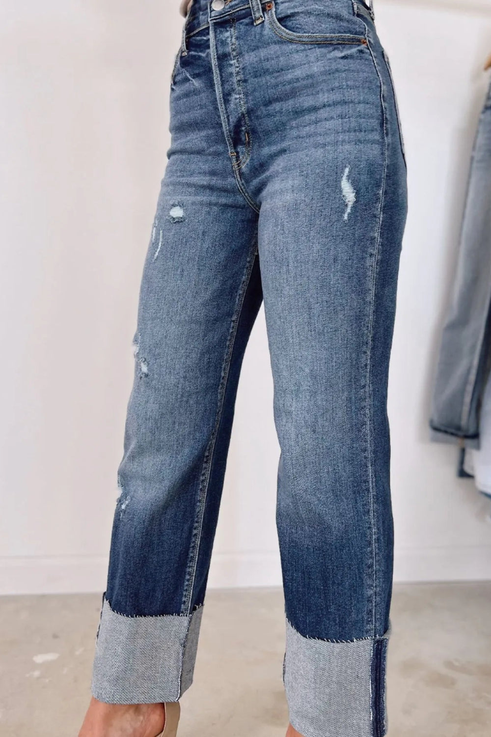 Jeans, straight leg, high-rise, distressed, pocketed, belt loops, raw hem, double button/zipper closure, slightly stretchy, front view