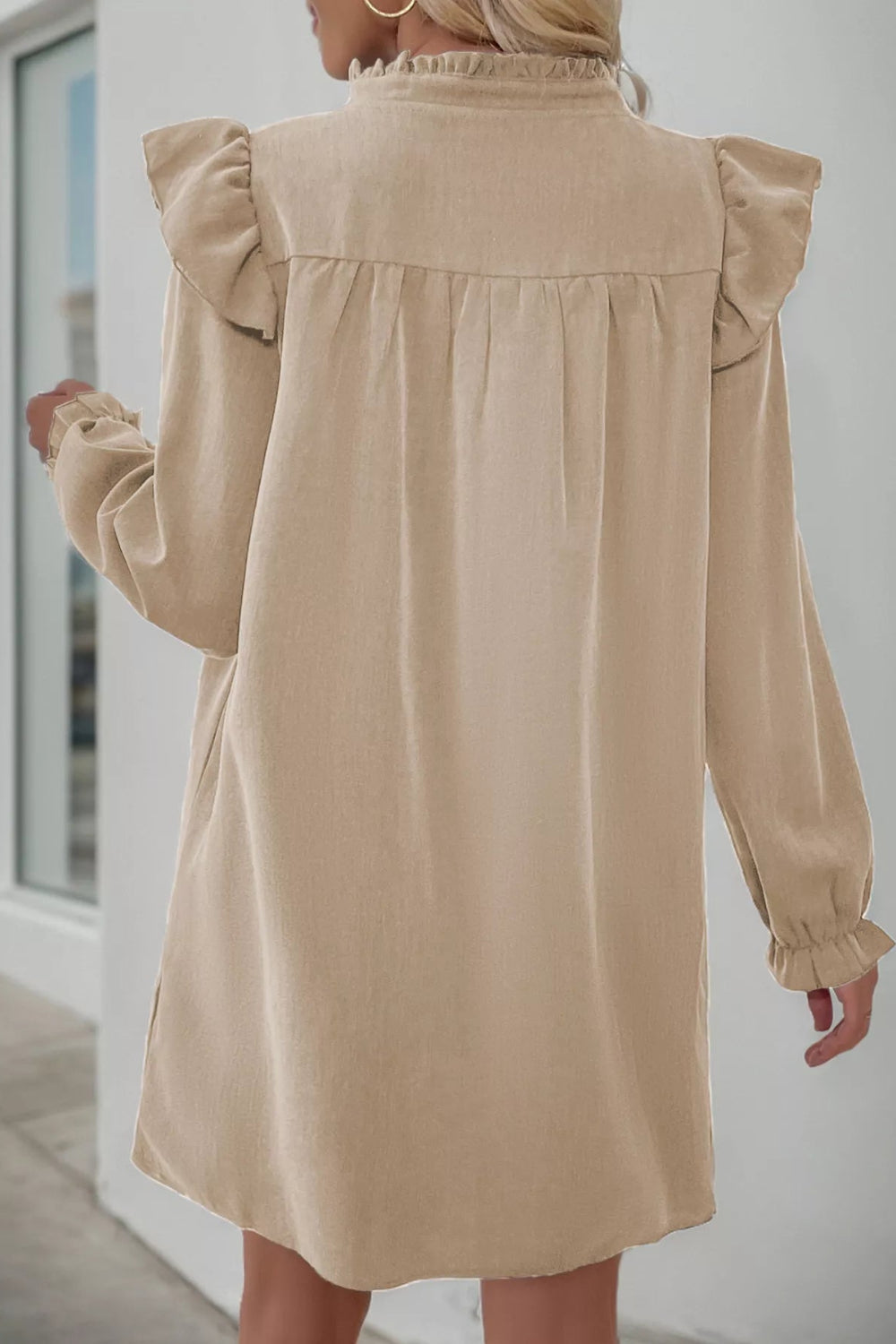 Mini dress, long sleeve, ruffled, v-neck, baby doll design, pullover, unlined, side slit, no stretch, back view