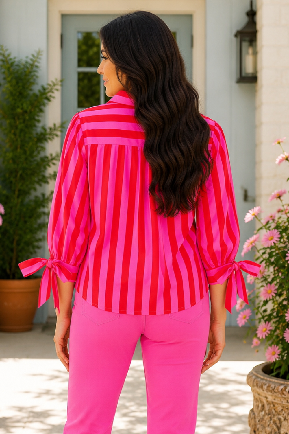 * Collared neck
* Buttoned
* Half puff tied sleeves
* Slightly stretchy
