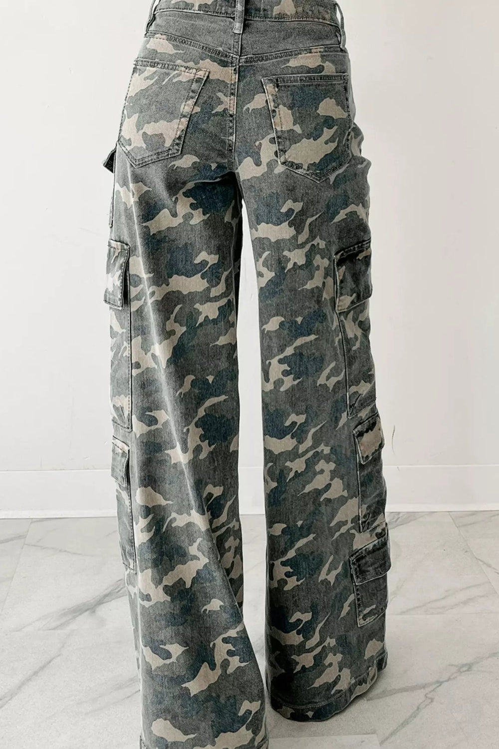 Jeans, cargo, camo print, belt loops, zipper/button closure, wide leg, some stretch, high waist, back view