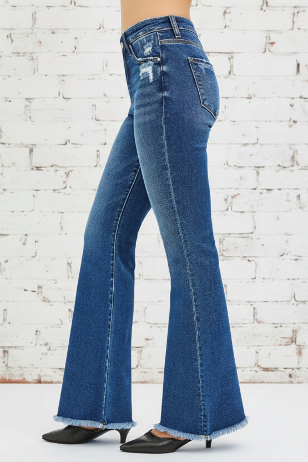 Risen Jeans, high-rise, flared, distressed, raw hem, belt loops, pocketed, button/zipper closure, slightly stretchy, front view